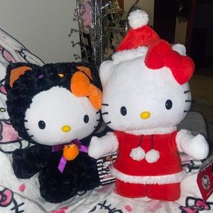 Hello Kitty Christmas and Halloween greeter plushies (selling both together)